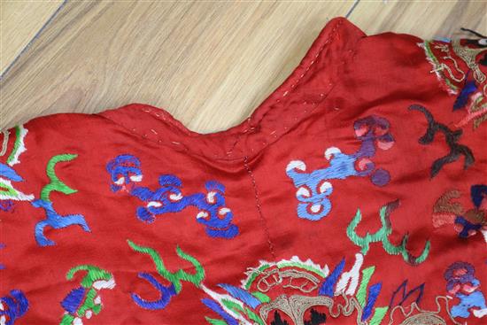 A Chinese embroidered silk dragon robe, early 20th century